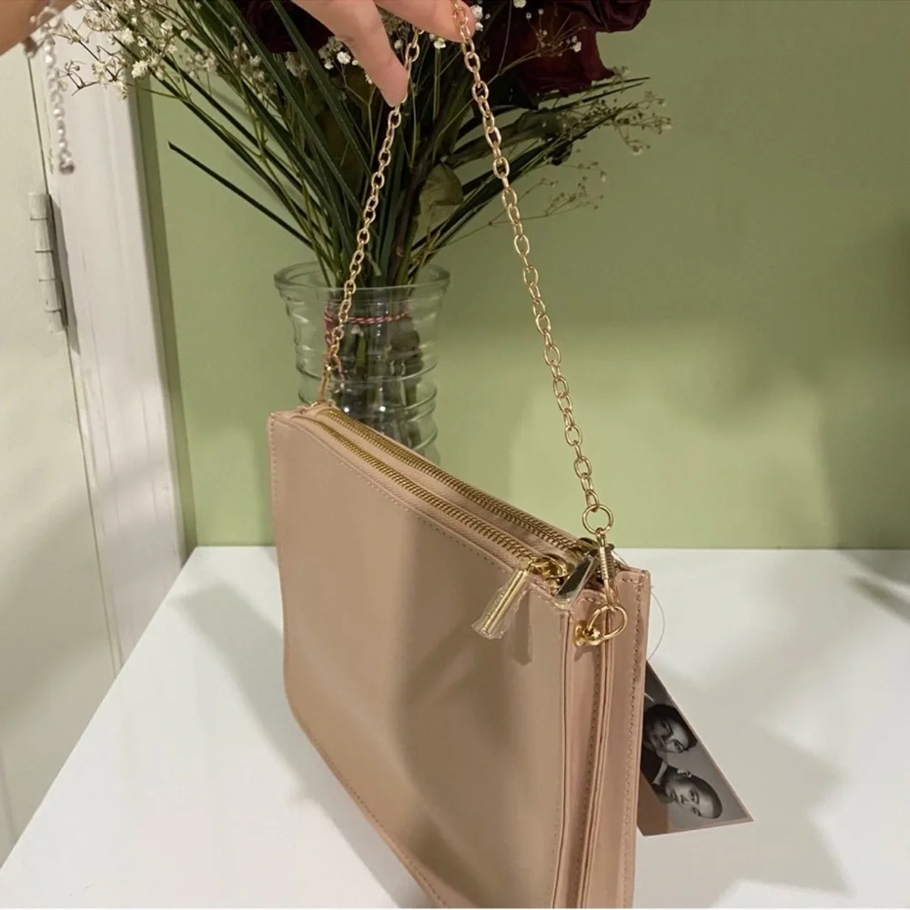 Authentic Jason Wu cosmetic beauty pouch converted to a crossbody bag